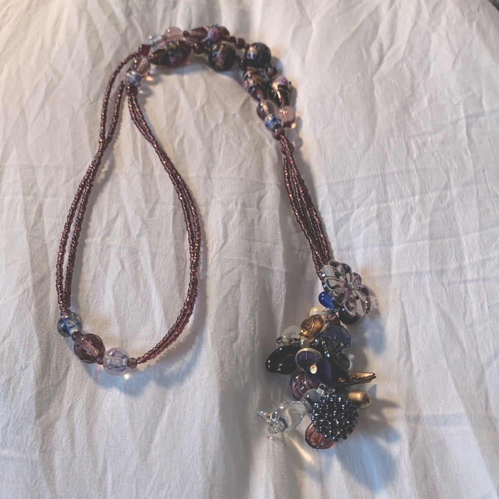Handmade pendant with vintage beads and charms in shades of purple and rose